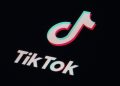 FILE - The icon for the video sharing TikTok app is seen on a smartphone, Feb. 28, 2023, in Marple Township, Pa. The state of Montana is asking a federal judge to allow its ban on downloading TikTok to take effect in January, even though the company argues it violates free speech rights. The state argues there are other apps that people can use to communicate with each other that don't include the risk of sharing data with the Chinese government. The company and content creators had asked the judge to temporarily block the law from taking effect while their legal challenge plays out. (AP Photo/Matt Slocum, File)