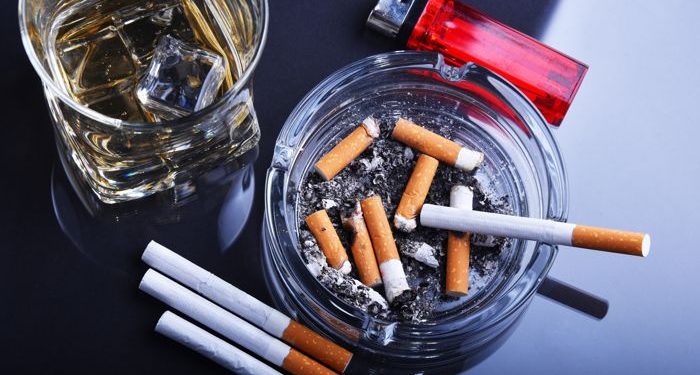 Ashtray and cigarettes. Tobacco smoking. Nicotine addiction