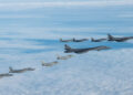 U.S. Air Force F-15C Eagles, F-15E Strike Eagles, assigned to the 48th Fighter Wing, and Royal Air Force Typhoon FGR4s escort B-1 Lancer Bombers, assigned to Dyess Air Force Base, Texas, during a bomber task force mission in the North Sea Region, Nov. 10, 2021. The mission highlights U.S. capabilities and commitment to work closely with our allies and partners to deter any potential adversary from aggressive actions. (U.S. Air Force photo by Senior Airman Koby I. Saunders)