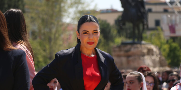 Zv/kryeministrja dhe ministrja per infrastrukturen dhe energjine, Belinda Balluku gjate nje mitingu te organizuar ne sheshin Skenderbej, per celjen e fushates zgjedhore te Partise Socialiste per zgjedhjet e 11 majit. Eventi eshte ideuar si nje olimpiade ku kandidatet jane prezantuar si atlete, dhe kane deklaruar numrin e mandateve qe do te arrijne./r/n/r/nDeputy Prime Minister and Minister of Infrastructure and Energy, Belinda Balluku during a rally organized in Skanderbeg Square, to launch the Socialist Party's election campaign for the May 11 elections. The event was designed as an Olympics where the candidates presented themselves as athletes, and declared the number of mandates they will achieve.