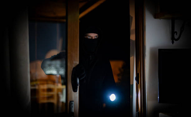 The thief breaks into the house through the balcony.