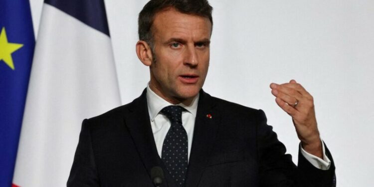 FILE PHOTO: France's President Emmanuel Macron delivers a press conference upon the signing of the declaration on deploying post-ceasefire force in Ukraine during the so-called 'Coalition of the Willing' summit, at the Elysee Palace in Paris, France, January 6, 2026. Ludovic Marin/Pool via REUTERS/File Photo