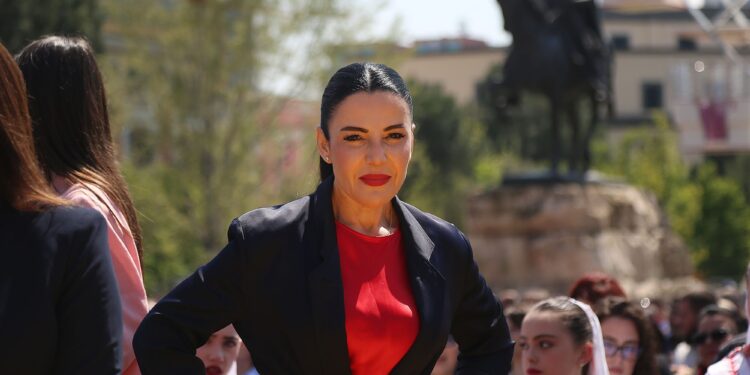 Zv/kryeministrja dhe ministrja per infrastrukturen dhe energjine, Belinda Balluku gjate nje mitingu te organizuar ne sheshin Skenderbej, per celjen e fushates zgjedhore te Partise Socialiste per zgjedhjet e 11 majit. Eventi eshte ideuar si nje olimpiade ku kandidatet jane prezantuar si atlete, dhe kane deklaruar numrin e mandateve qe do te arrijne./r/n/r/nDeputy Prime Minister and Minister of Infrastructure and Energy, Belinda Balluku during a rally organized in Skanderbeg Square, to launch the Socialist Party's election campaign for the May 11 elections. The event was designed as an Olympics where the candidates presented themselves as athletes, and declared the number of mandates they will achieve.