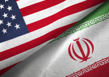Iran and United States flags together realtions textile cloth fabric texture